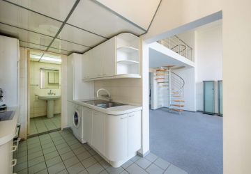 Küche mit Blick in das Wohnzimmer